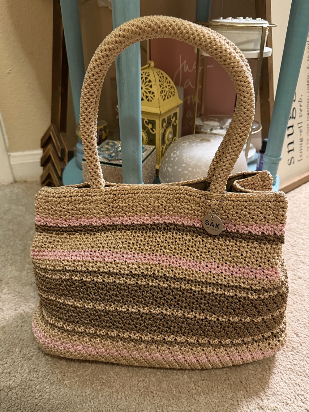 The Sak Crochet Woven Straw Tote in Pink and Tan Stripes